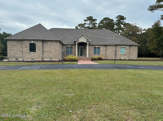 view of front of home with a front yard