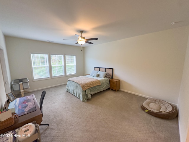 bedroom featuring carpet and ceiling fan