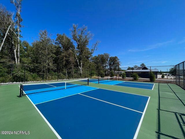 view of sport court with basketball court