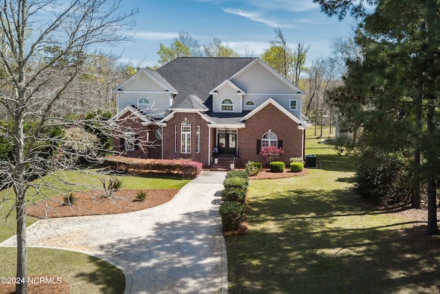 view of front of home featuring a front lawn