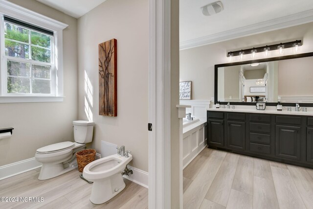 interior space featuring white cabinetry, butcher block counters, and sink