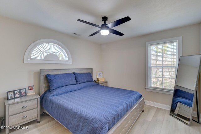 bathroom with a bidet, hardwood / wood-style floors, crown molding, and toilet