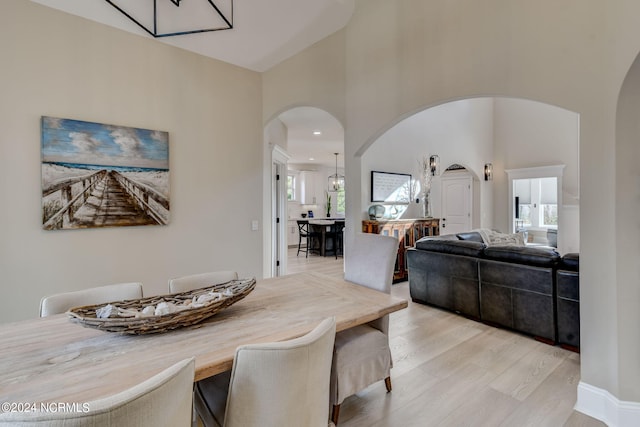 entryway featuring french doors and light wood-type flooring