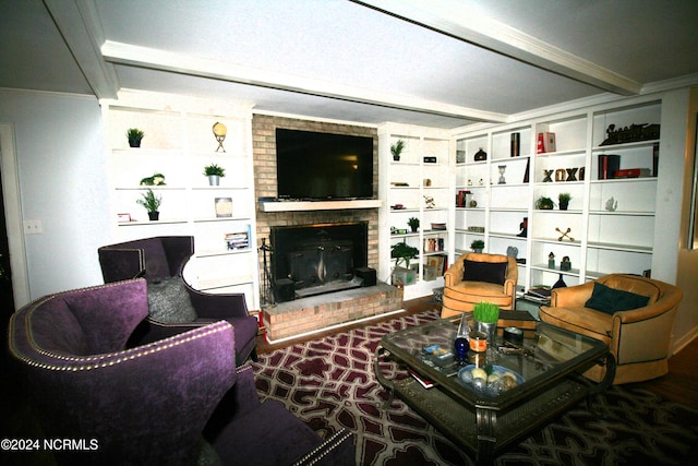 living room featuring beam ceiling, crown molding, and a brick fireplace