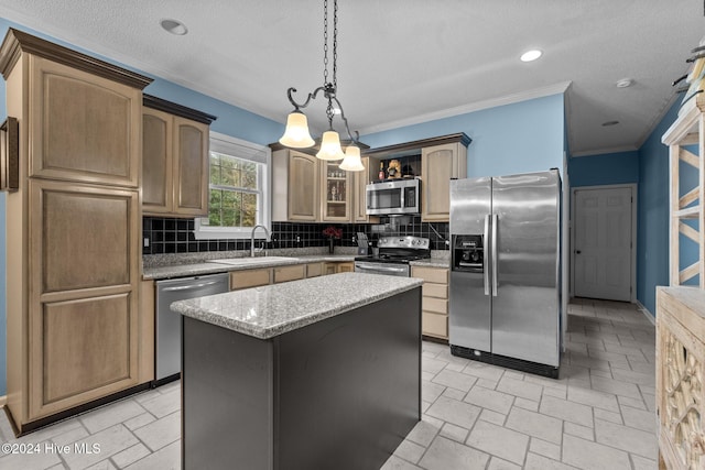 kitchen with backsplash, a center island, stainless steel appliances, and hanging light fixtures