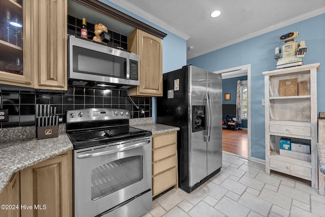 kitchen featuring a textured ceiling, light brown cabinets, crown molding, and stainless steel appliances