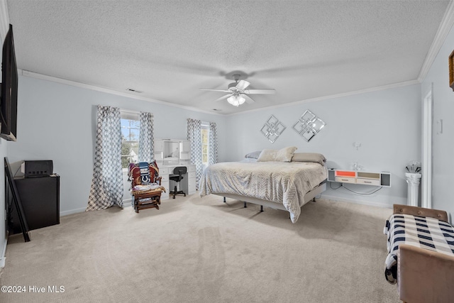 bedroom featuring ceiling fan, crown molding, light carpet, and a textured ceiling