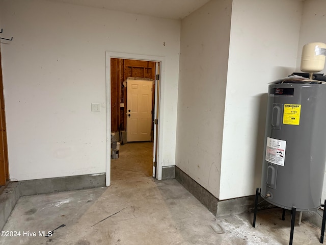 utility room featuring electric water heater