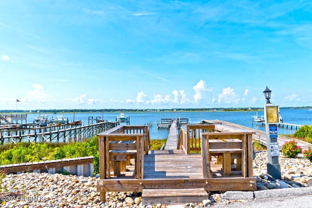 dock area featuring a water view