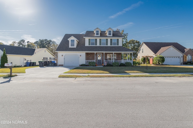 view of front of property featuring covered porch and a front yard