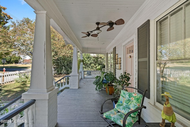 wooden deck with ceiling fan