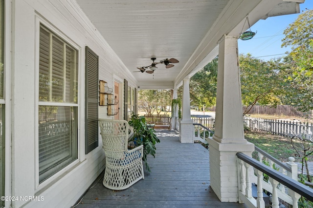 wooden terrace with ceiling fan