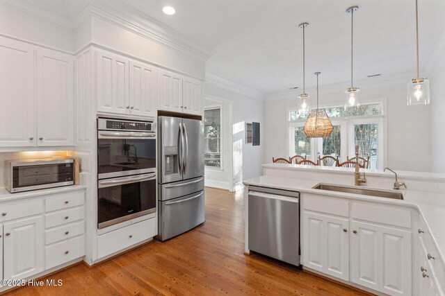 dining area featuring crown molding and dark hardwood / wood-style flooring