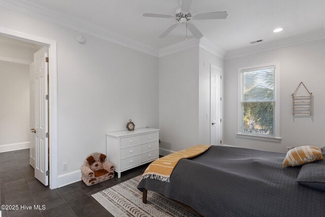 bedroom featuring hardwood / wood-style floors, ceiling fan, and ornamental molding