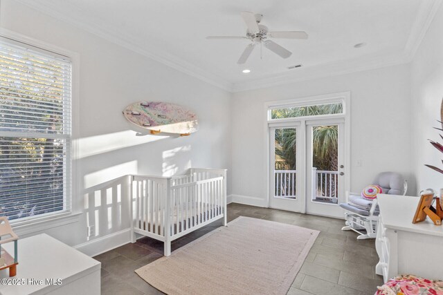 bedroom featuring ceiling fan and crown molding