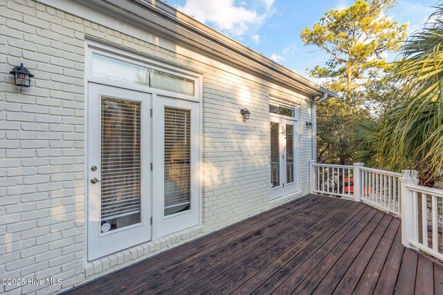 wooden terrace with a sunroom