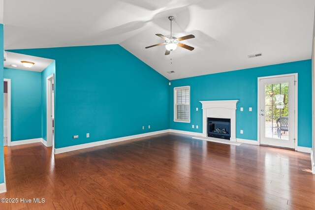 8525 Primm Forest Dr, Leland, NC 28451 - unfurnished living room with a fireplace, ceiling fan, ornate columns, and wood finished floors