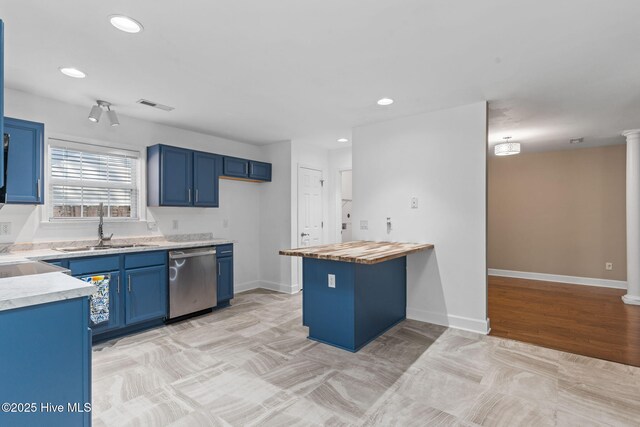 8525 Primm Forest Dr, Leland, NC 28451 - kitchen featuring a sink, stainless steel appliances, butcher block counters, visible vents, and blue cabinetry