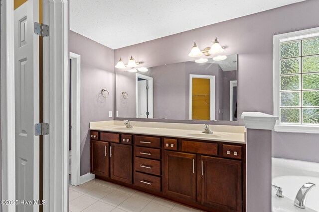 8525 Primm Forest Dr, Leland, NC 28451 - bathroom featuring toilet, baseboards, vanity, and a spacious closet