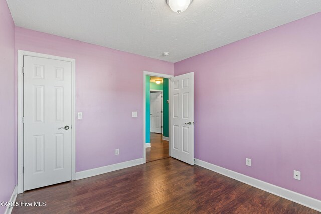 8525 Primm Forest Dr, Leland, NC 28451 - bedroom featuring wood finished floors and baseboards