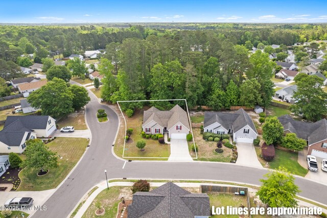 8525 Primm Forest Dr, Leland, NC 28451 - aerial view featuring a forest view and a residential view