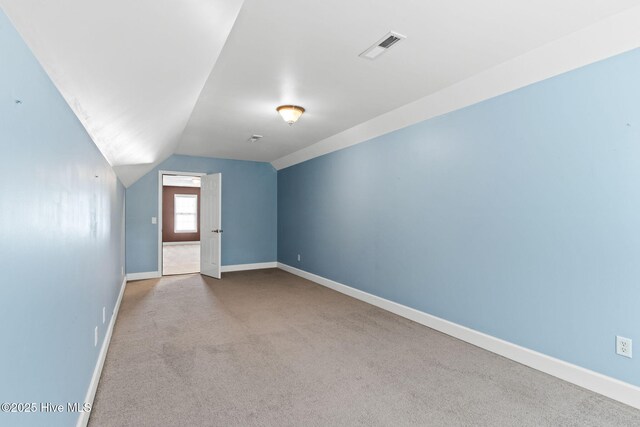 8525 Primm Forest Dr, Leland, NC 28451 - bonus room with vaulted ceiling, carpet, and baseboards