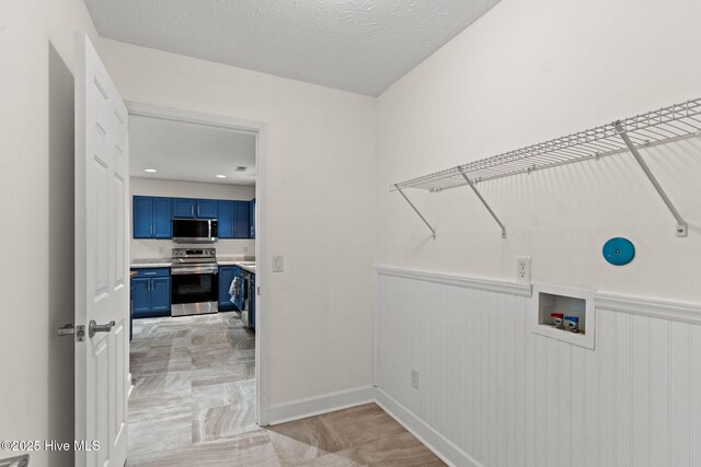 8525 Primm Forest Dr, Leland, NC 28451 - garage with a garage door opener and baseboards