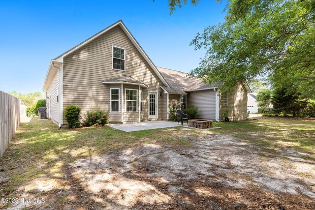 8525 Primm Forest Dr, Leland, NC 28451 - view of grassy yard with a fire pit and a patio