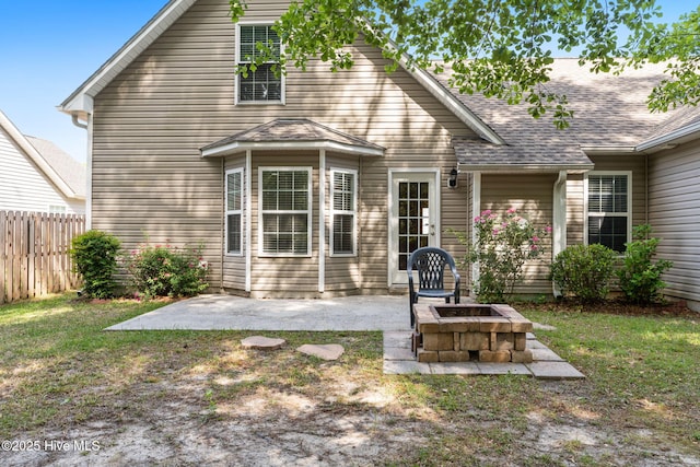 8525 Primm Forest Dr, Leland, NC 28451 - rear view of property with a fire pit and a patio area