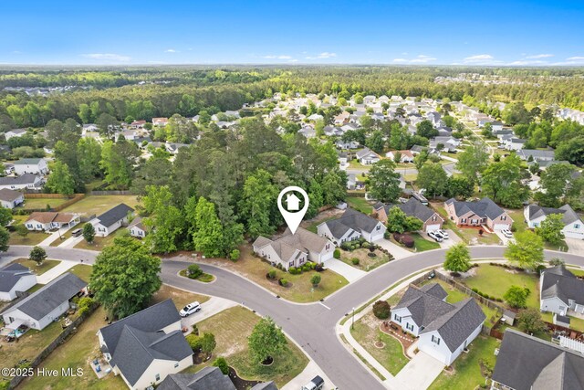 8525 Primm Forest Dr, Leland, NC 28451 - bird's eye view with a wooded view and a residential view