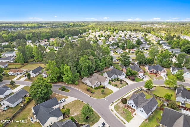 8525 Primm Forest Dr, Leland, NC 28451 - aerial view of property's location with nearby suburban area and a forest