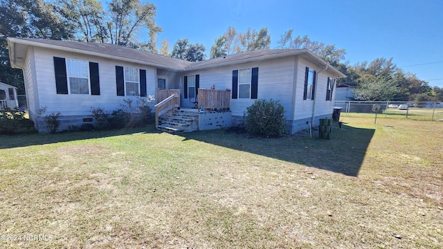 ranch-style house with a front yard