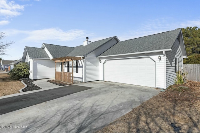 ranch-style home featuring a garage and covered porch