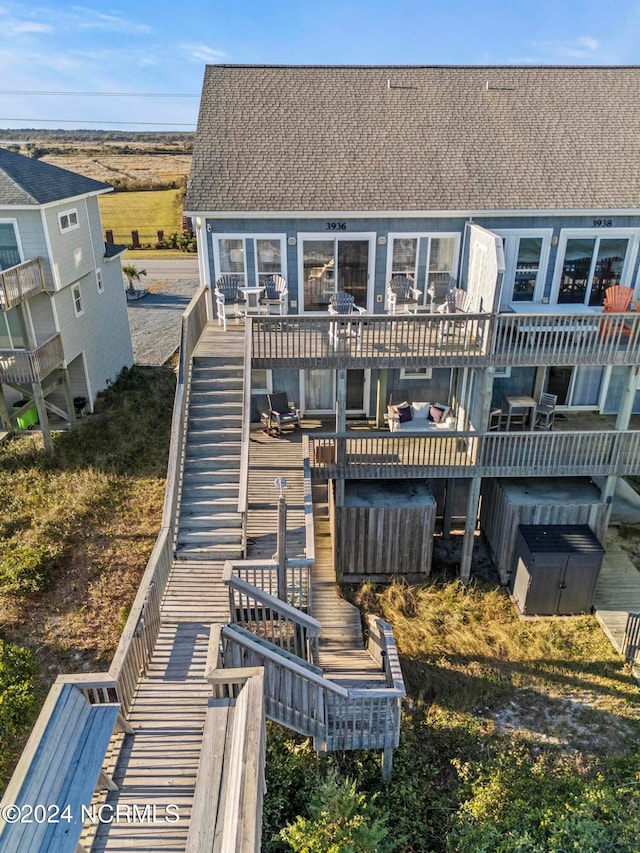 rear view of house with a deck