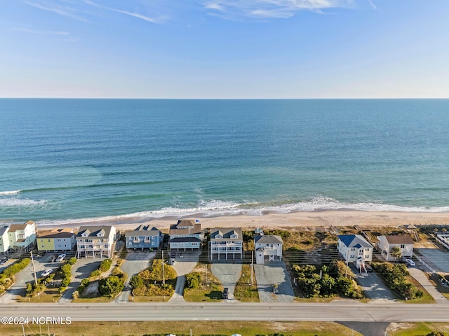 drone / aerial view with a view of the beach and a water view