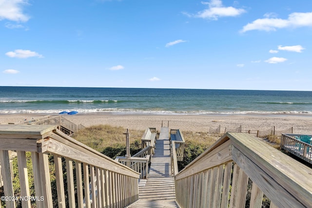 water view featuring a beach view