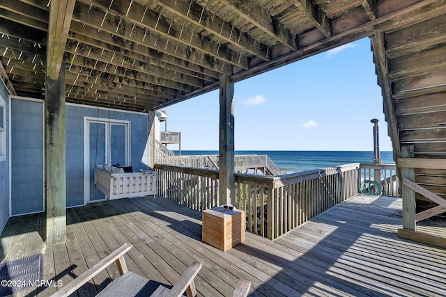 deck featuring a water view