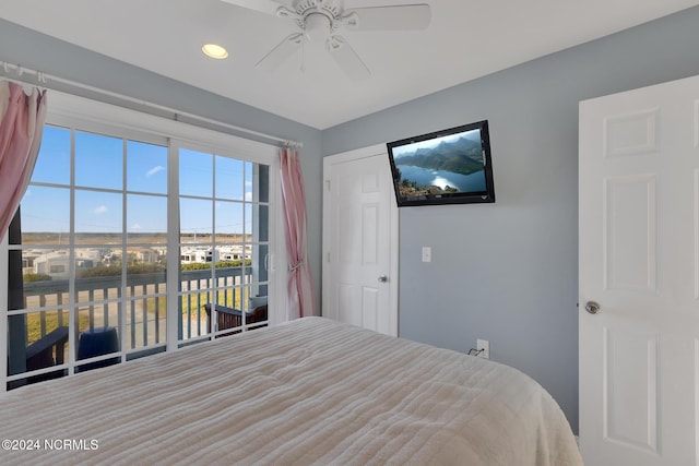 bedroom with ceiling fan and access to exterior