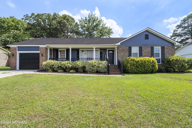 single story home featuring a porch, a front lawn, and a garage