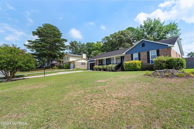 ranch-style house with a front lawn