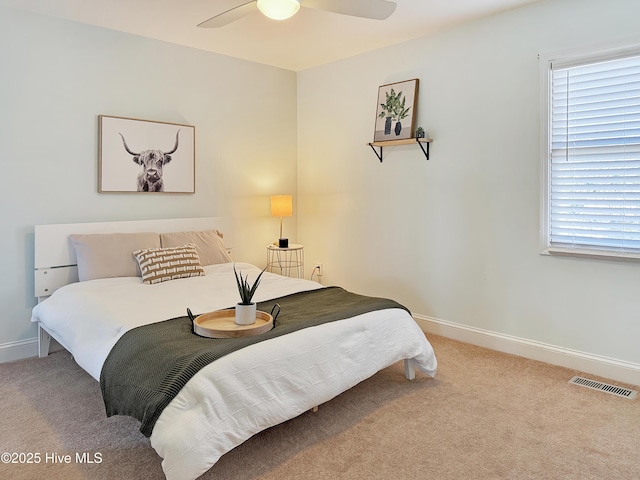 1324 Final Landing Ln, Wilmington, NC 28411 - bedroom featuring carpet, multiple windows, and ceiling fan