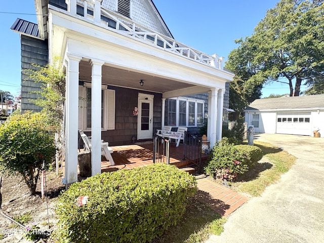 view of front of home with an outbuilding and a garage