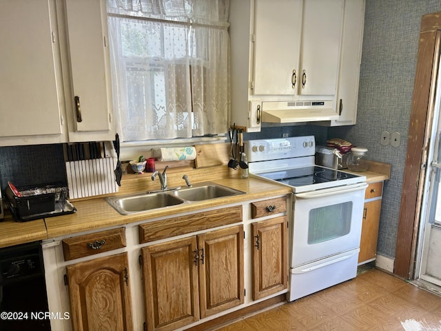 kitchen with white range with electric cooktop, black dishwasher, and sink