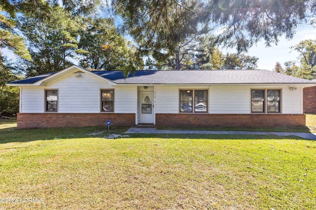 510 Millhouse Rd, Castle Hayne, NC 28429 - ranch-style house with a front yard and brick siding