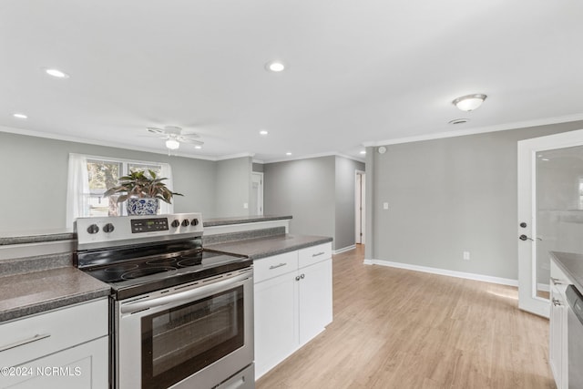 510 Millhouse Rd, Castle Hayne, NC 28429 - kitchen featuring recessed lighting, stainless steel electric range oven, ornamental molding, dark countertops, and white cabinets
