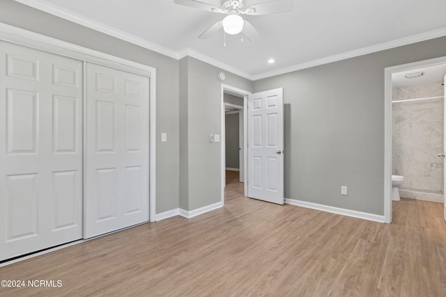 510 Millhouse Rd, Castle Hayne, NC 28429 - unfurnished bedroom with a closet, crown molding, ensuite bathroom, baseboards, and light wood-style floors