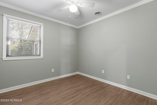 510 Millhouse Rd, Castle Hayne, NC 28429 - unfurnished room featuring a ceiling fan, baseboards, visible vents, crown molding, and wood finished floors