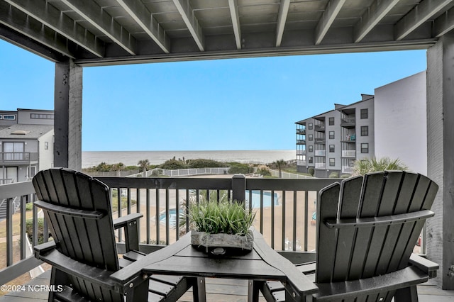 balcony featuring a water view