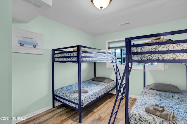 bedroom featuring hardwood / wood-style flooring