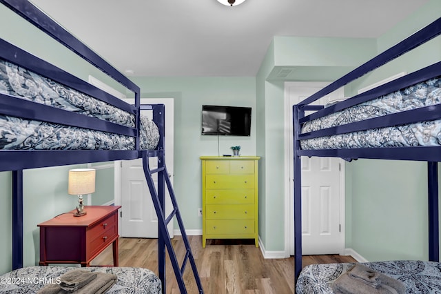 bedroom featuring hardwood / wood-style flooring